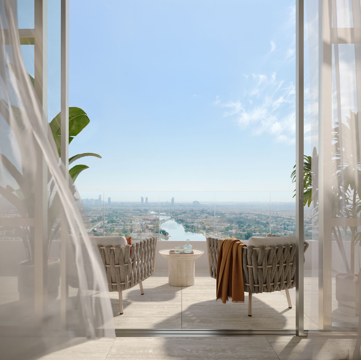 Balcony with two armchairs looking over Jumeirah Islands lakes