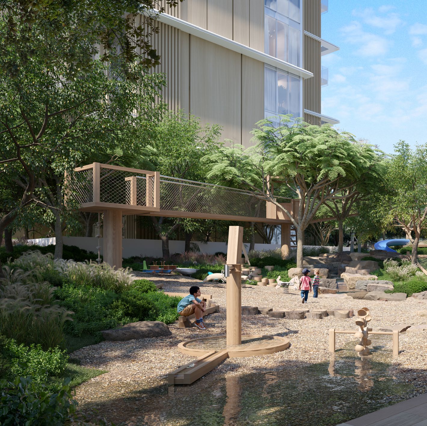 Children's nature playground with water play and a timber treehouse bridge